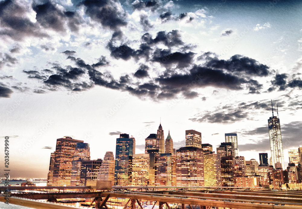 Manhattan at sunset from Brooklyn Bridge