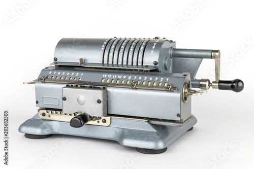 Vintage Russian mechanical machine for mathematical calculations, isolated on white background