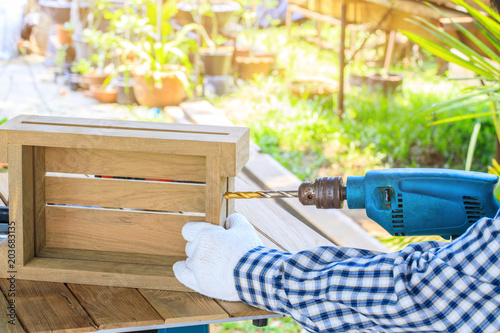 Carpenter is working woodwork. photo