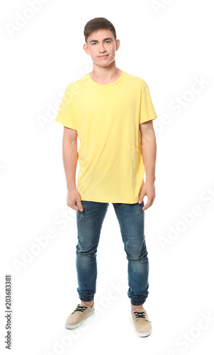 Trendy teenage boy on white...