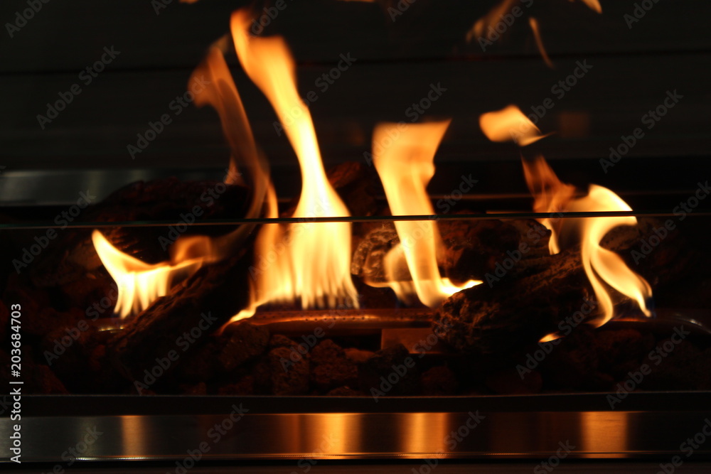 Flickering flames in fire and reflection. Flickering flames in fire and reflection.