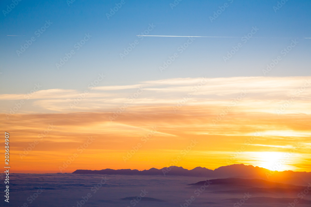 Mountain silhouette at sundown