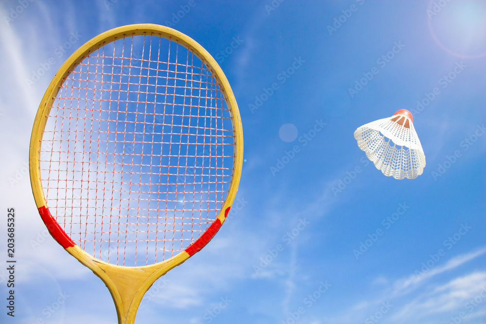 Badminton racket and shuttlecock flying Stock Photo