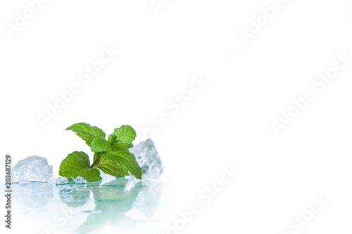 ice cubes and mint leaves isolated on a white background