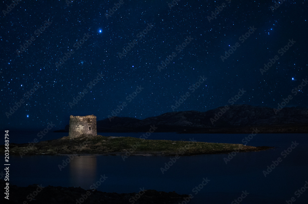 Night seascape with tower