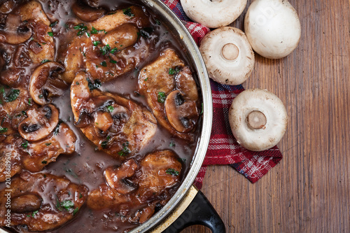 Delicious chicken marsala on frying pan