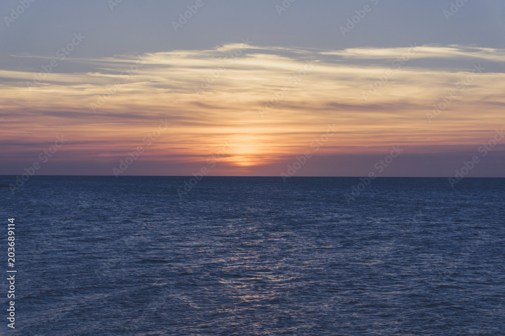 sunset over the sea sunset over the sea