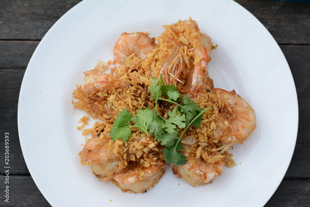 close up fried shrimp with garlic and green vegetacle close up fried shrimp with garlic and green vegetacle