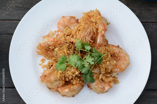 close up fried shrimp with garlic and green vegetacle