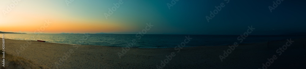 Panoramic landscape of the beach at sunset