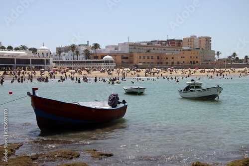  Boats off the coast near the beach of La Catalina in Cadiz.