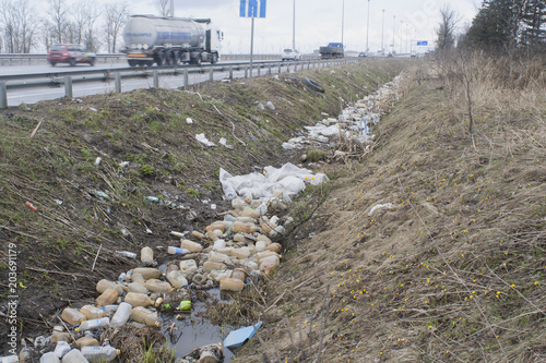 trash in a roadside ditch
