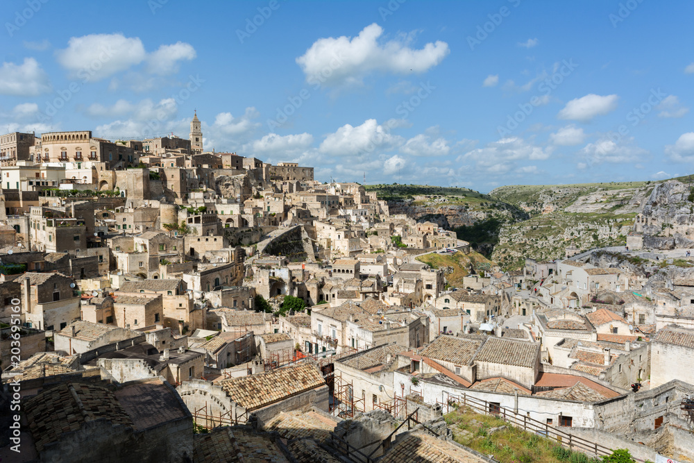 Horizontal View of the City of Matera and the Sassi on Blue Sky Background
