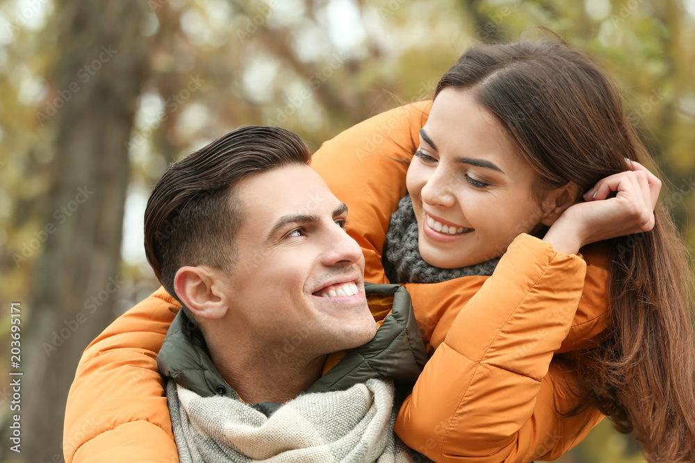 Beautiful couple in warm clothes outdoors Beautiful couple in warm clothes outdoors