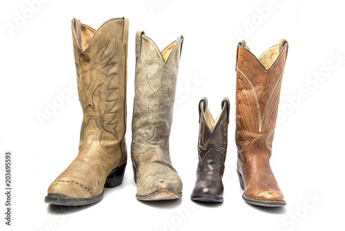 Different types of cowboy boots. concept of family