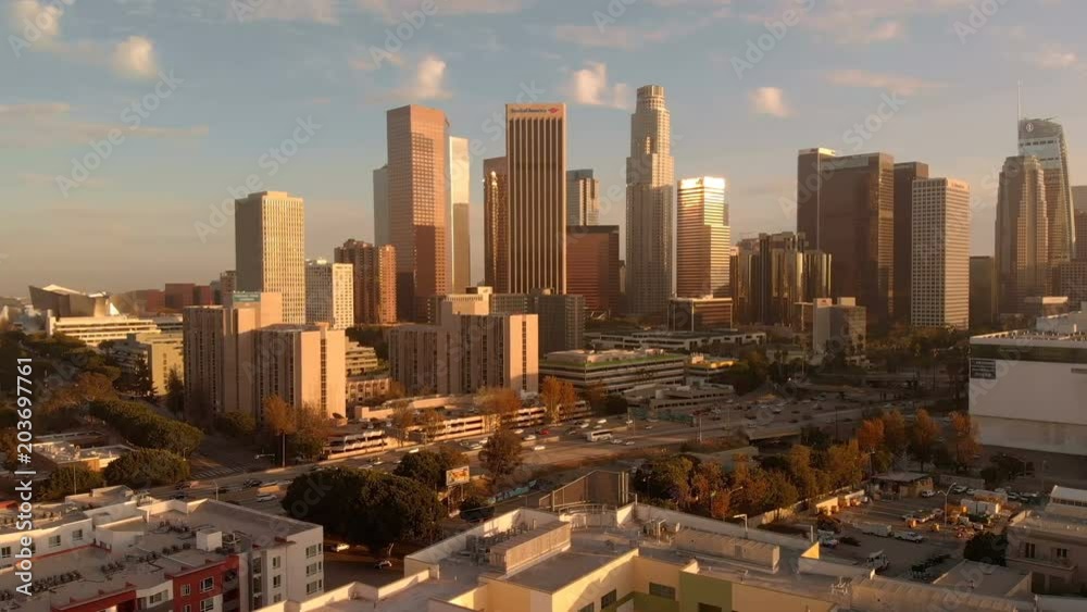 Aerial Shot of Los Angeles Downtown and Freeway Traffic at Sunset California USA