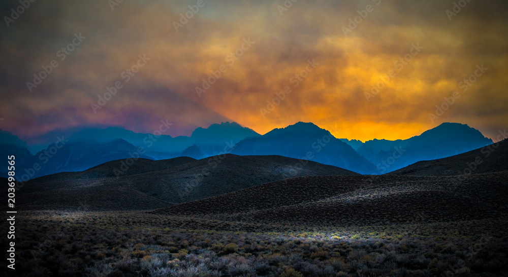 A photo of Yosemite Nation Park during a sun setting. A photo of Yosemite Nation Park during a sun setting.
