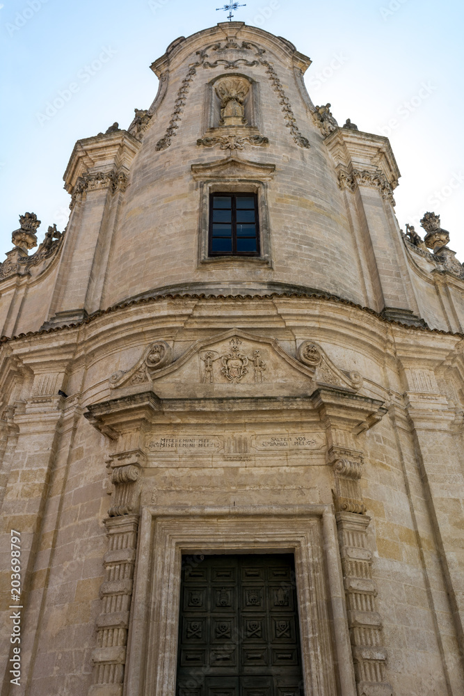 Vertical View of the Facade of the Exterior of the Church of Purgatory on Blue Sky Background