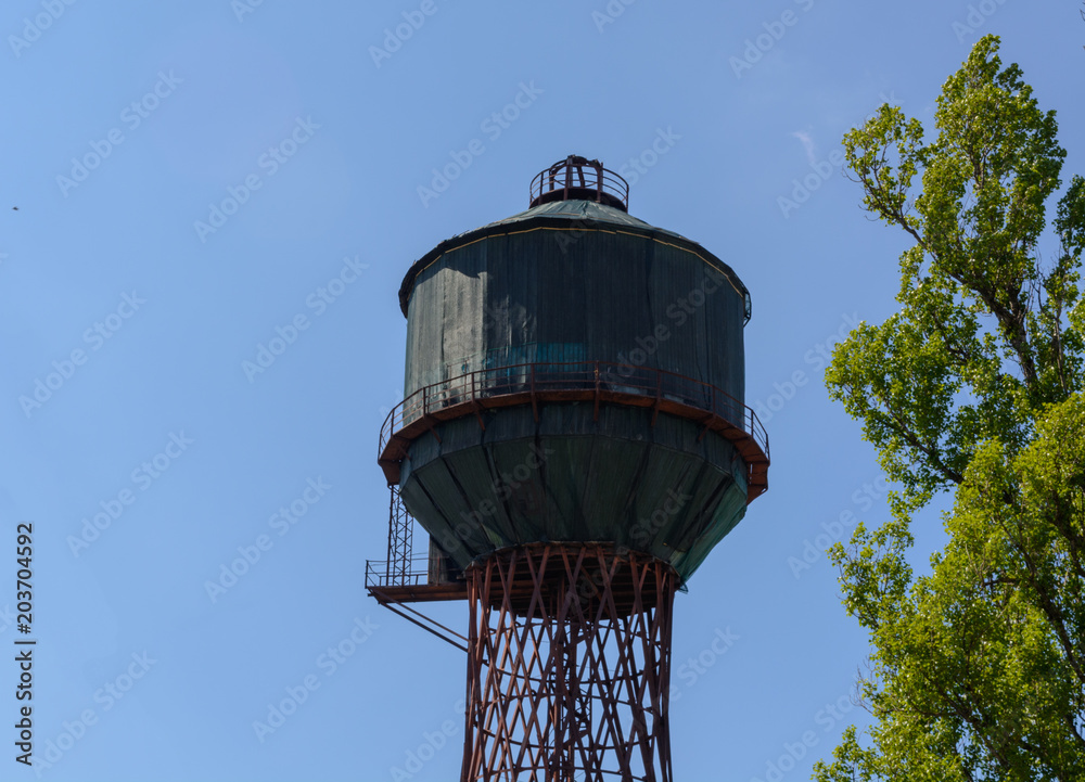 the water tower on the sky background