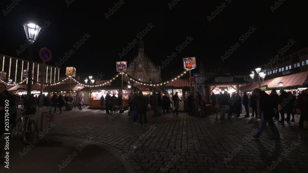Tourists at the Christmas market in Hauptmarkt Tourists at the Christmas market in Hauptmarkt