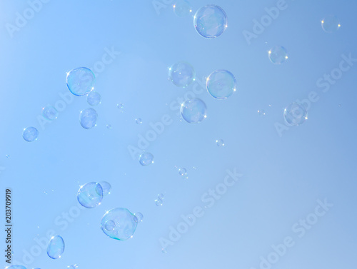 Wallpaper Mural Soap bubbles, Blowing soap bubble on Blue sky background Torontodigital.ca