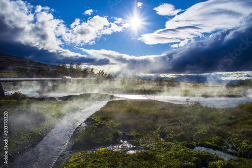 Scenic view of Deildartunguhver hot spring in Reykholtsdalur, Iceland. The most powerful thermal spring in Europe. Water used for central heating and growing vegetables in greenhouses.