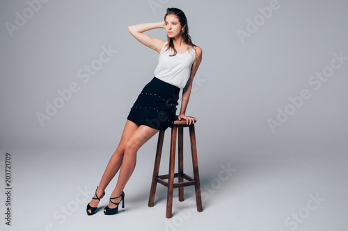 High fashion portrait of young elegant woman. Studio shot