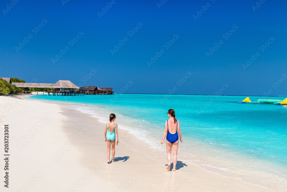 Mother and daughter at beach