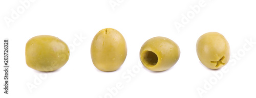 Pitted and marinated green olives isolated on white background.
