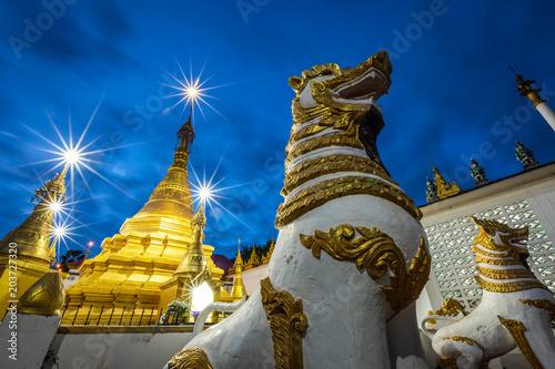 Photography Golden Pagoda, Buddhist architecture Wat Thai Watthanaram at dusk, Mae Sot, Tak,