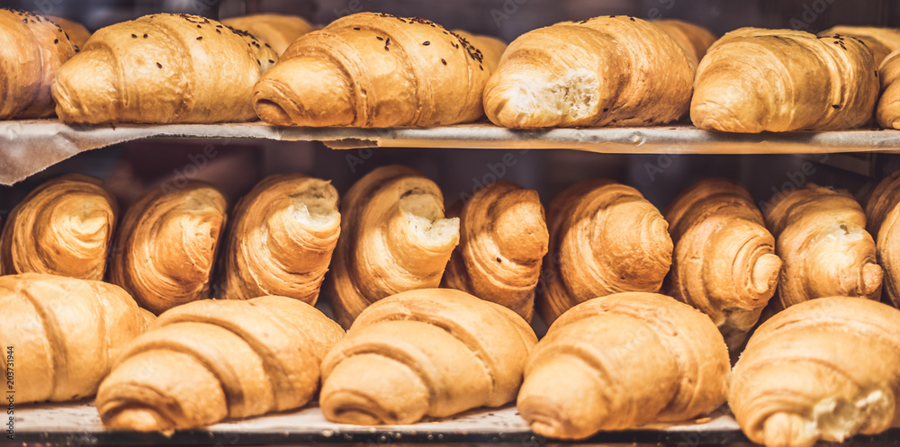 French Croissants on a showcase in a bakery shop