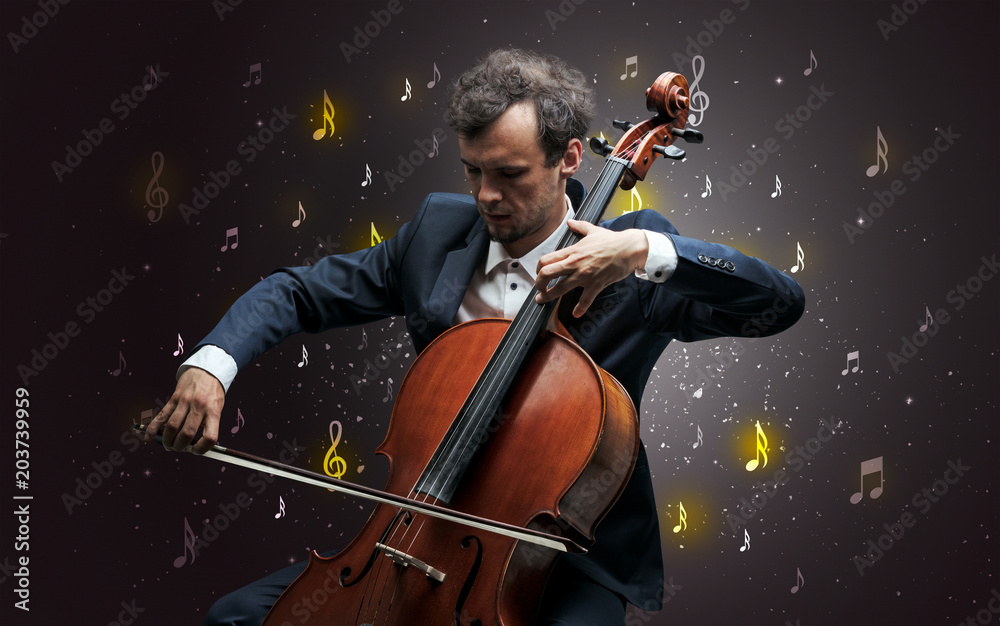 Fototapeta premium Young cellist with falling musical notes wallpaper and classical concept