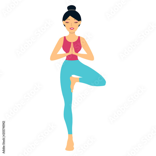 Young woman doing yoga exercise tree-pose