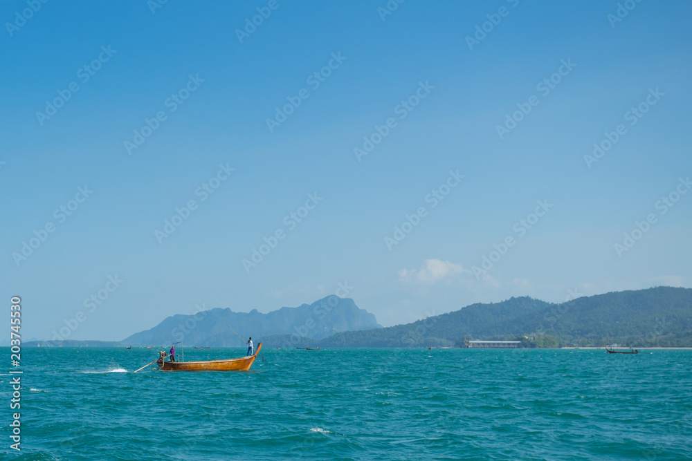 A long tail boat in the sea in Krabi Thailand