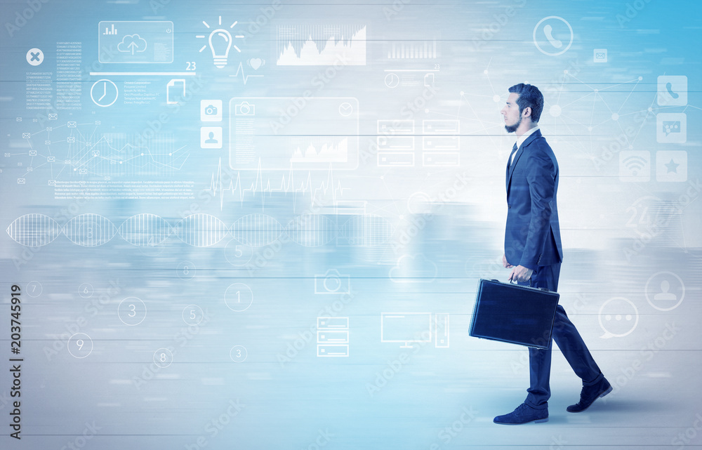 Handsome businessman walking in suit with briefcase on his hand and database concept around
Handsome businessman walking in suit with briefcase on his hand and database concept around