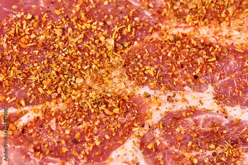 fresh raw beef steak with spices background, organic farm