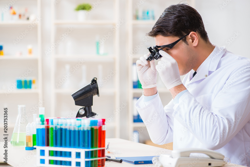Young chemical scientist working in lab Young chemical scientist working in lab
