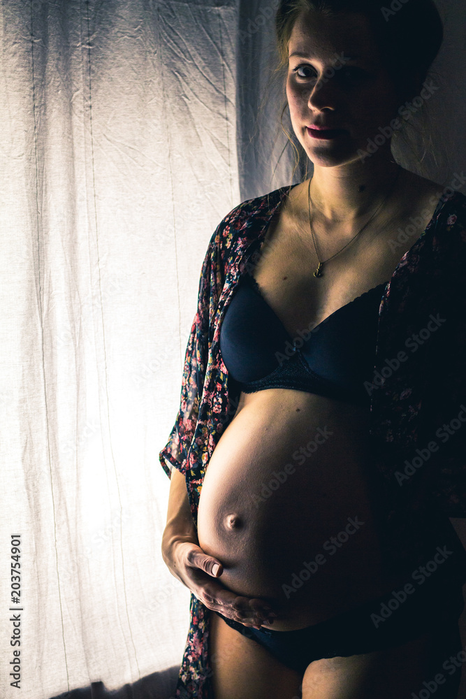 sensual pregnant woman in lingerie Stock Photo