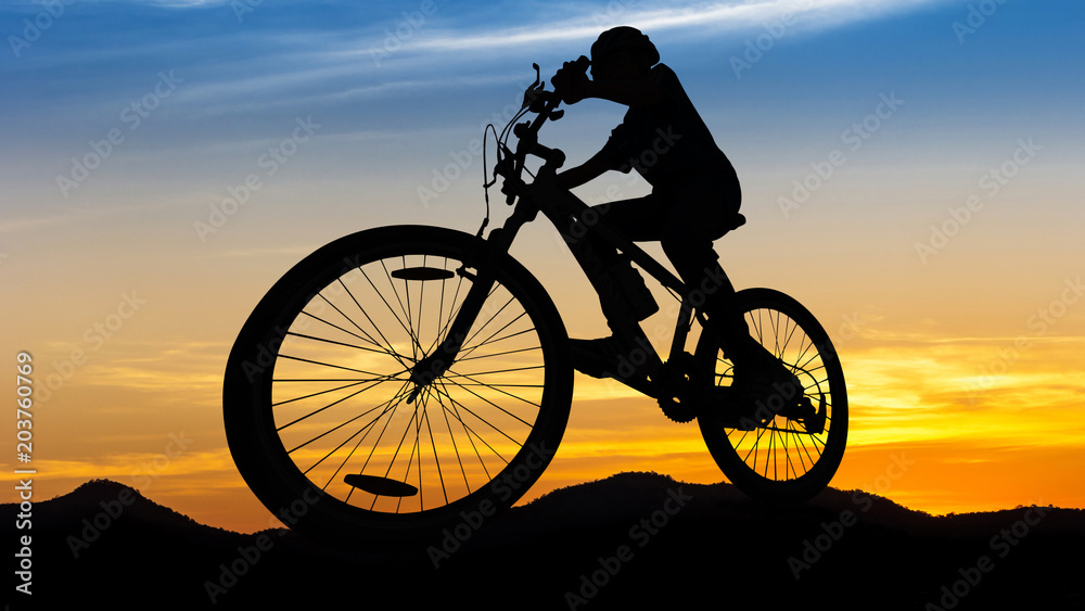 Fototapeta premium People cycling at the hill mountain twilight time