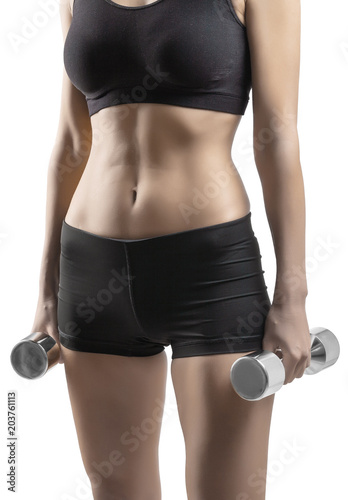 vertical view very close up view on female holding dumbbells in 