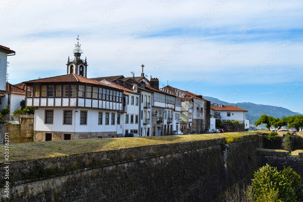 Obraz premium Typical old houses inside of the fortress walls of the Valença's old quarter, Portugal