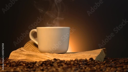 coffe cup with roasted beans photo