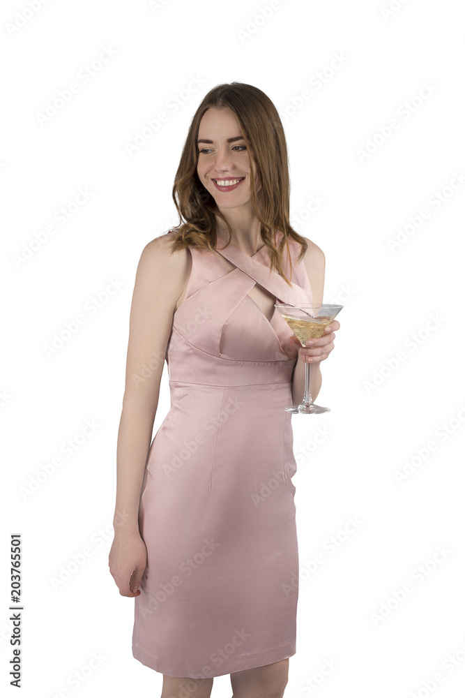 The young attractive woman in an evening dress with a glass of coctail, isolated The young attractive woman in an evening dress with a glass of coctail, isolated