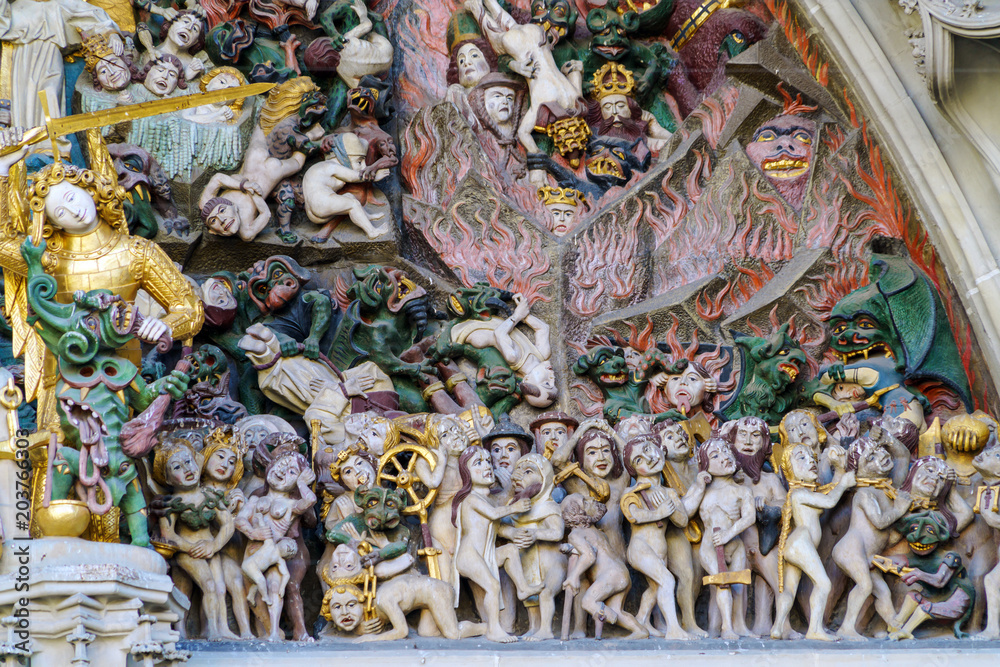Main entrance of Minster cathedral with Last Judgement stone carving, Bern, Switzerland Main entrance of Minster cathedral with Last Judgement stone carving, Bern, Switzerland