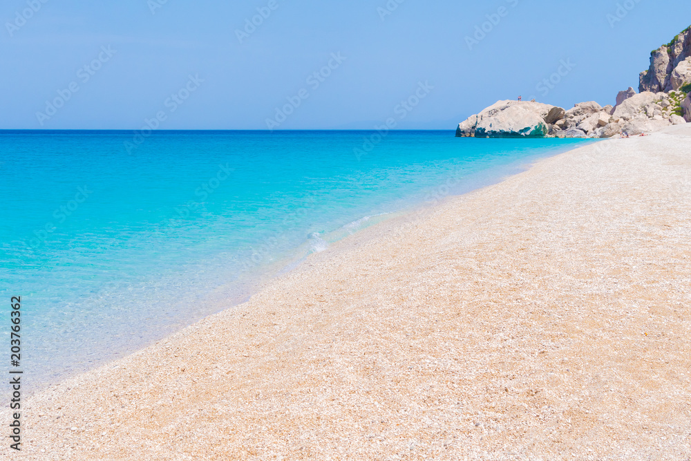 Crystal clear turquoise sea waters of a pebble beach. Kathisma beach in Lefkada ionian island in Greece