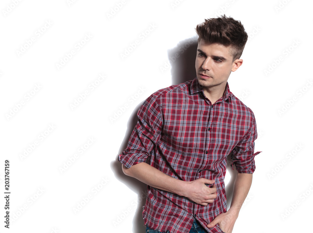 portrait of sexy young man looking to side