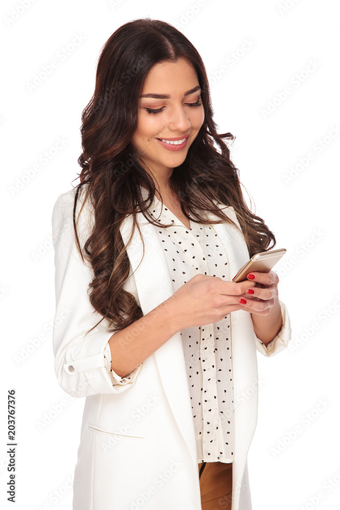 portrait of businesswoman texting on a smartphone portrait of businesswoman texting on a smartphone