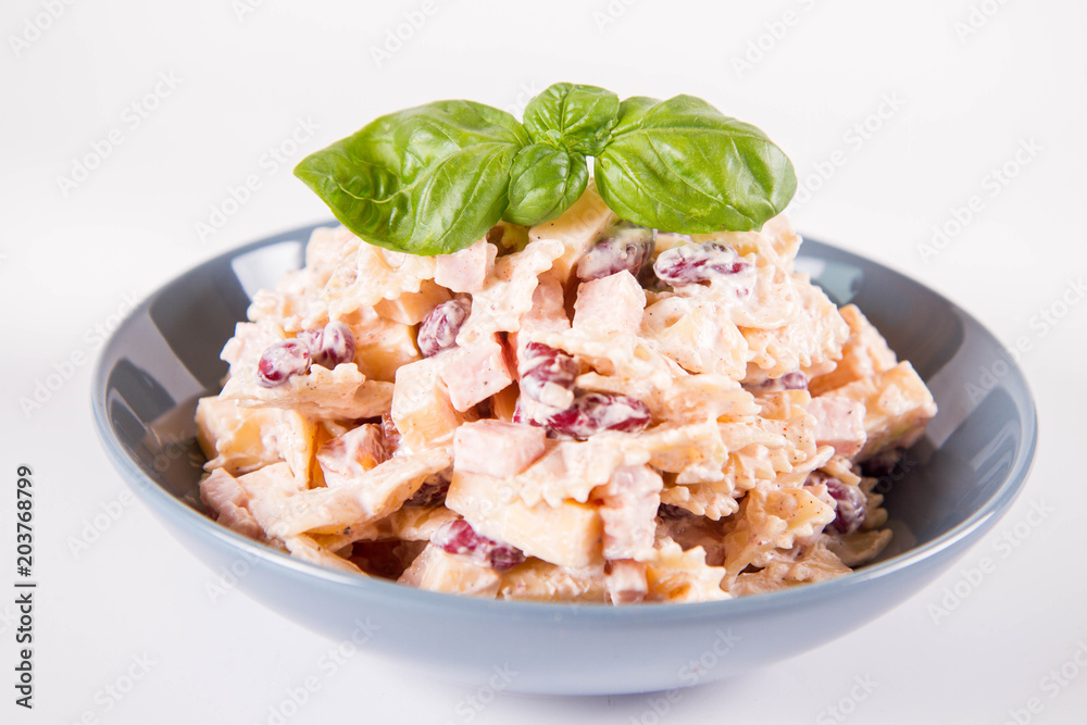 Pasta salad with cheese, ham, kidney beans and mayonnaise Pasta salad with cheese, ham, kidney beans and mayonnaise