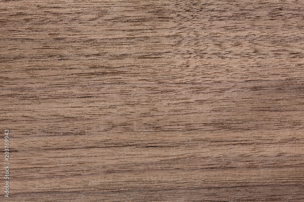 Fototapeta premium Expensive nut veneer texture for your stylish desktop.