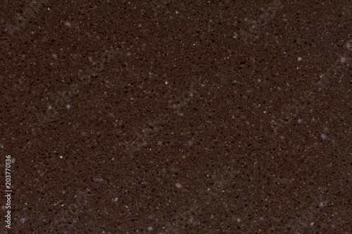 Brown stony texture with shiny surface.